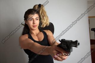 OXANA AND XENIA STANDING POSE WITH GUNS 3 (3)